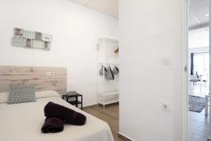 Ένα ή περισσότερα κρεβάτια σε δωμάτιο στο Currimar +18 φωτογραφίες