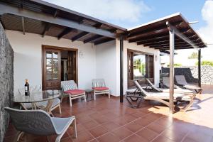 Patio nebo venkovní prostory v ubytování Villa Las Palmeras