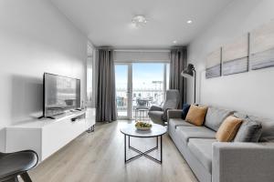 Posezení v ubytování Modern & Stylish Downtown Apartment