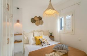 Ένα ή περισσότερα κρεβάτια σε δωμάτιο στο Piperi-2 Bedroom home