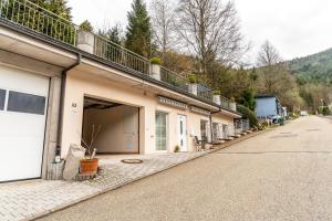 an empty street in front of a building at Ferienhaus Brigitte in Hornberg