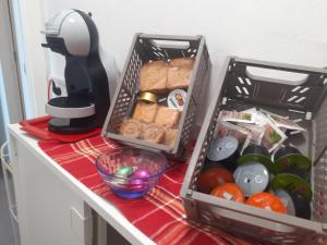 a container of food and other items on a counter at B&B Daniela in Darfo