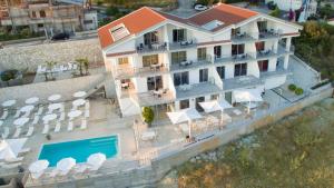 an aerial view of a hotel with a swimming pool at Santo Stefano Club in Praia a Mare