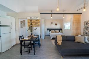 a living room with a couch and a table at Apartamento Jibazahora Escorpio in Zahora