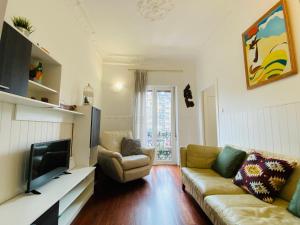 Televízia a/alebo spoločenská miestnosť v ubytovaní La plaza apartment