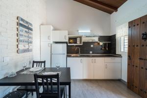 Kuchyň nebo kuchyňský kout v ubytování Apartamento Jibazahora Virgo