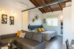 Posezení v ubytování Apartamento Jibazahora Virgo + 37 fotografií