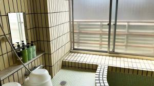 Koupelna v ubytování Kagetsu Ryokan