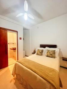 Postel nebo postele na pokoji v ubytování hospedagem da Mari