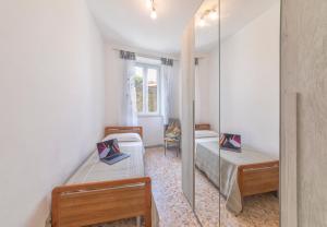 Ένα ή περισσότερα κρεβάτια σε δωμάτιο στο Casa degli Aranci