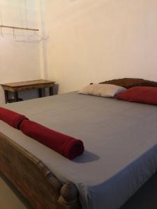 Postel nebo postele na pokoji v ubytování Macondo Mpai bay + 13 fotografií
