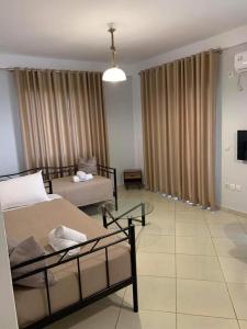 Postel nebo postele na pokoji v ubytování Mediterranean Apartments