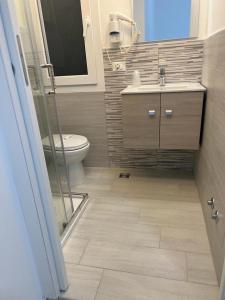 Koupelna v ubytování chiAma Hotel
