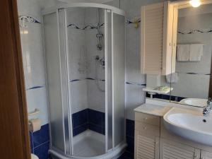 a bathroom with a shower and a sink at Villa rosa in Loano +73 photos