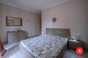 Ein Bett oder Betten in einem Zimmer der Unterkunft Terrazza Pini