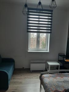Posteľ alebo postele v izbe v ubytovaní Apartamenty Marco 3 przy Dworcu-Stare Miasto-Super Wi Fi