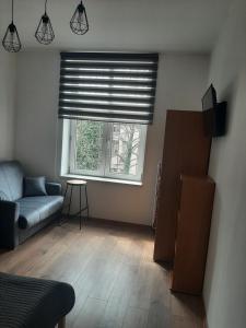 Posedenie v ubytovaní Apartamenty Marco 3 przy Dworcu-Stare Miasto-Super Wi Fi