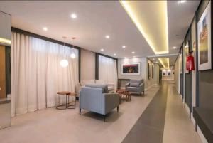 TV a/nebo společenská místnost v ubytování The Park- no coração de POA