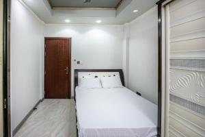 Postel nebo postele na pokoji v ubytování Nashee Home Stay