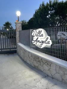Сертификат, награда, вывеска или другой документ, выставленный в Villa Angela case vacanza