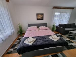 Voodi või voodid majutusasutuse Pension DonauBlick Grein 1 , Spitzfeldstr 1 toas