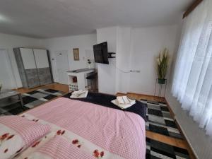 Voodi või voodid majutusasutuse Pension DonauBlick Grein 1 , Spitzfeldstr 1 toas