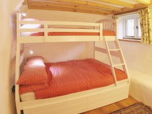 a couple of bunk beds in a room at Last Barn in Saint Twynnells