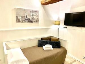 Ein Bett oder Betten in einem Zimmer der Unterkunft Perugia Mini Flat