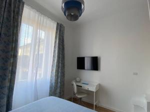 Телевизор и/или развлекательный центр в LM Tortona House