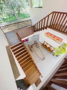 an overhead view of a staircase in a house at Coco Mantra Ilukwehera Estate 