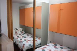 A bed or beds in a room at Dúplex Surf junto a la playa