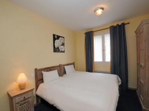 מיטה או מיטות בחדר ב-Hotel La Cabane