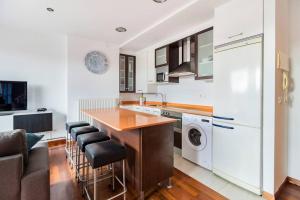 A kitchen or kitchenette at Dúplex Surf junto a la playa