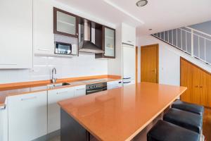 A kitchen or kitchenette at Dúplex Surf junto a la playa