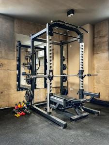 a room with a gym with a weight machine at Hotel Mediteran in Zadar