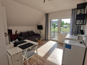 TV a/nebo společenská místnost v ubytování Sworny-Apartments