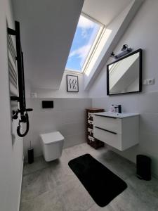 Koupelna v ubytování Sworny-Apartments + 28 fotografií
