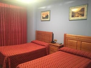 Postel nebo postele na pokoji v ubytování El Ancla