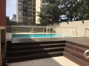 The swimming pool at or close to Comodidad, óptima ubicación y tranquilidad en Nuñez