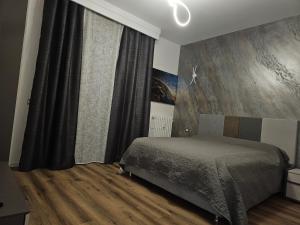Postel nebo postele na pokoji v ubytování Residence Laura