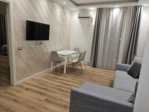 TV a/nebo společenská místnost v ubytování Residence Laura