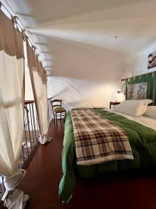 Ένα ή περισσότερα κρεβάτια σε δωμάτιο στο Villa Basso 2