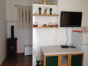TV a/nebo společenská místnost v ubytování Apartment Duncovich