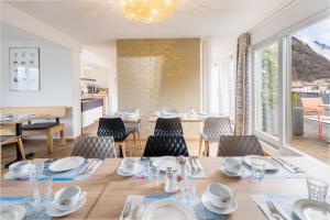 Restoran või mõni muu söögikoht majutusasutuses Hotel Merkur - West Station