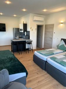 Ένα ή περισσότερα κρεβάτια σε δωμάτιο στο Apartment Im Sand nahe am See