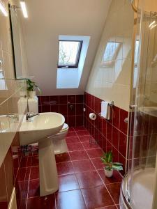 Ένα μπάνιο στο Barbakán Apartman Gyula