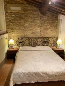 En eller flere senge i et værelse på Holidayhome Villa Torre