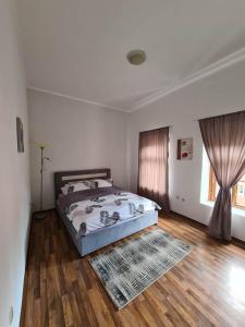 Postel nebo postele na pokoji v ubytování Stan Mostar-Mostovi