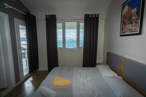 Katil atau katil-katil dalam bilik di Hotel Autochthonous