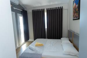 Katil atau katil-katil dalam bilik di Hotel Autochthonous